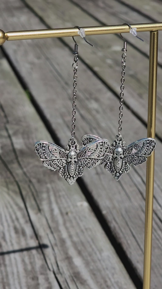 Butterfly Sphinx skull earrings